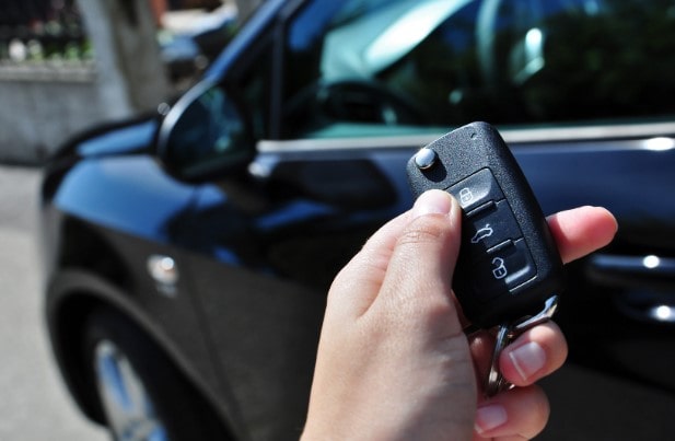 A car being unlocked by car key at quality auto locksmith wholesalers.