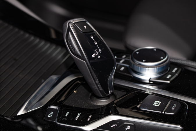 A close-up of a BMW automatic gear stick to show that android users now have access to bmw's digital key plus.